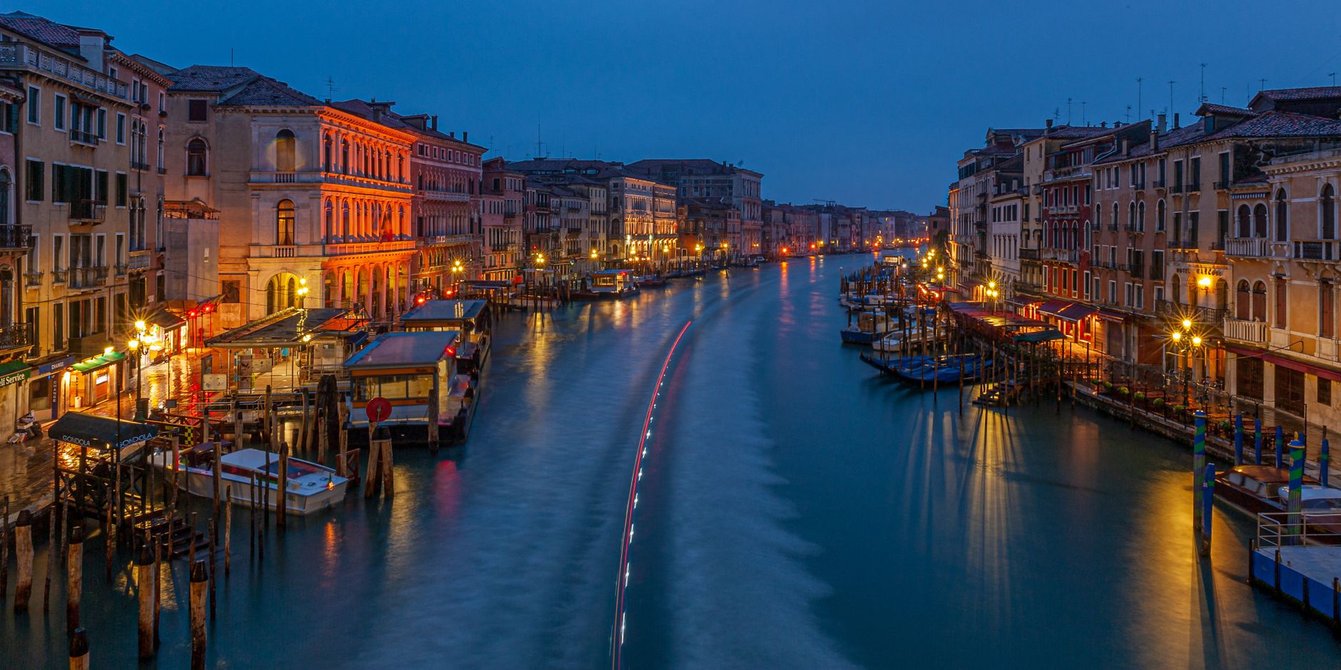 Discover the beauty of Venice's Grand Canal at twilight with its historic architecture and romantic ambiance