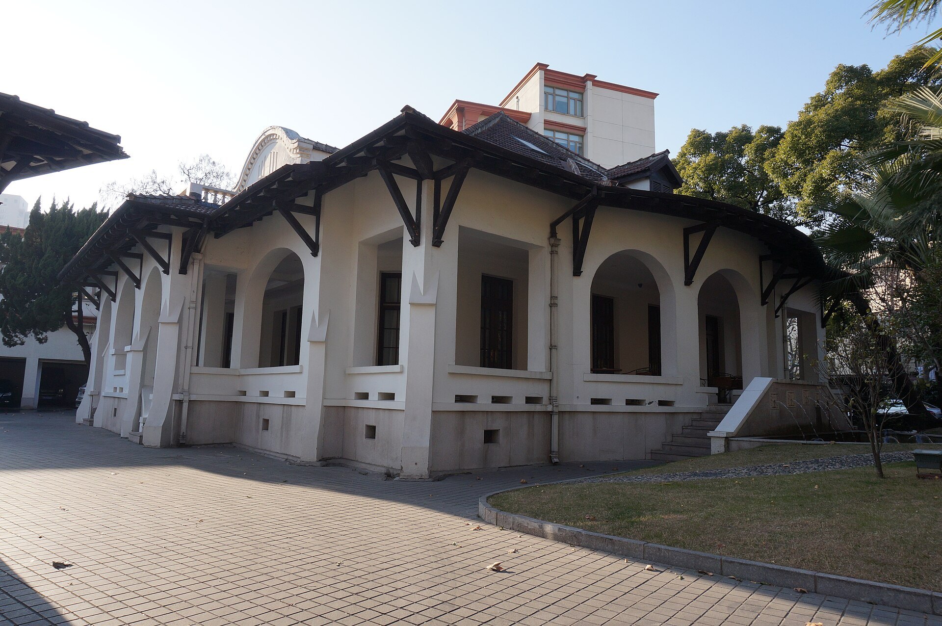The former Italian consulate building behind its garden wall