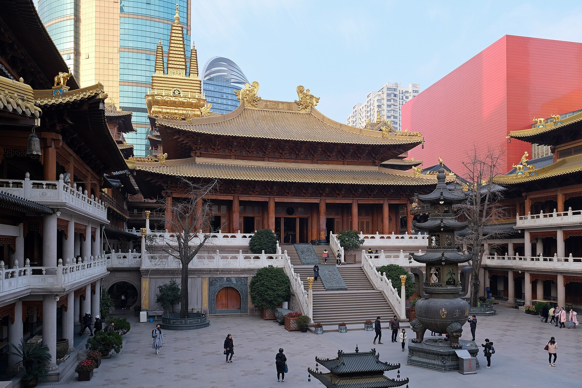 The temple courtyard with its bronze incense burner and red walls