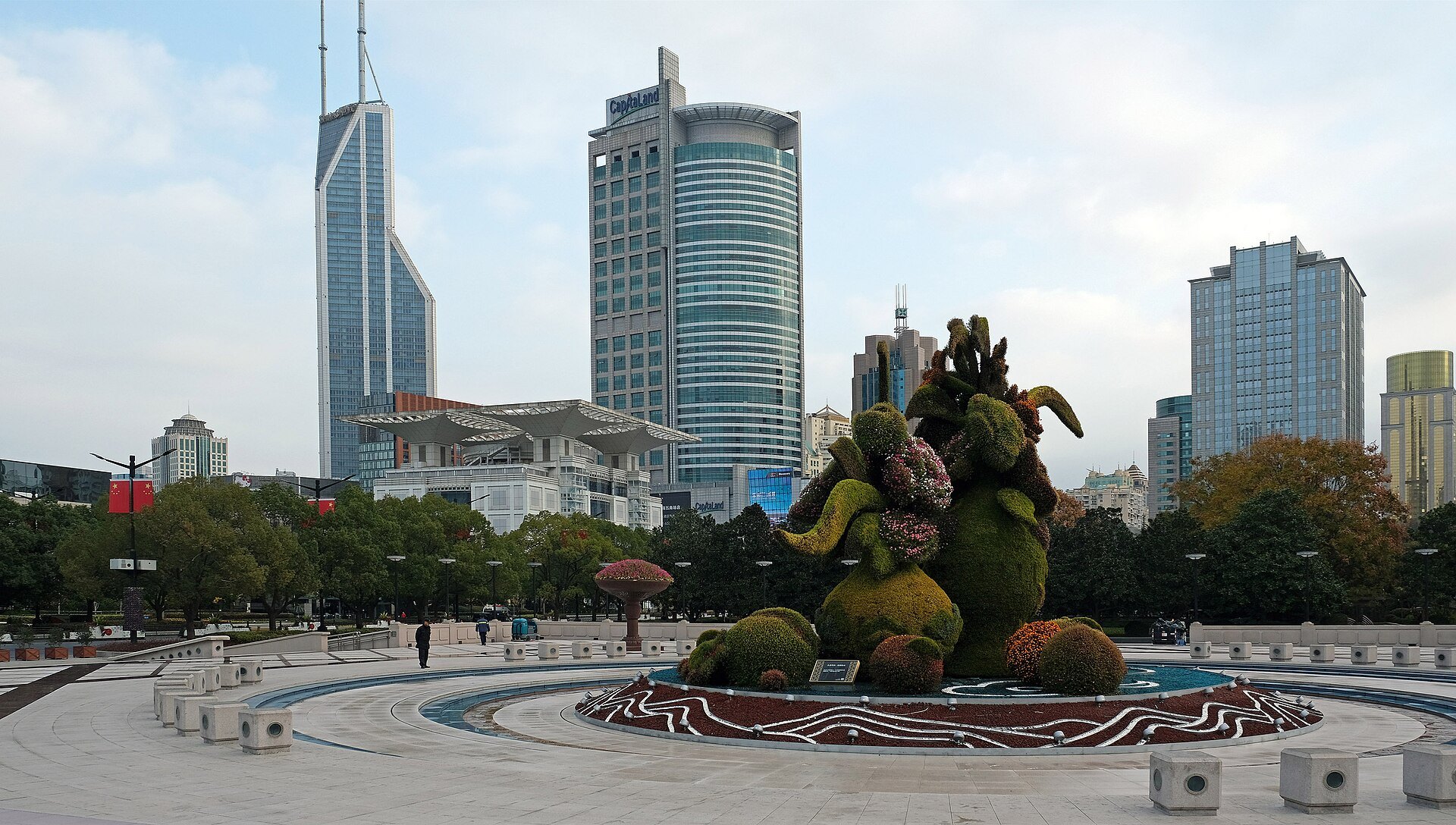 The fountain and topiary at the centre of People's Square