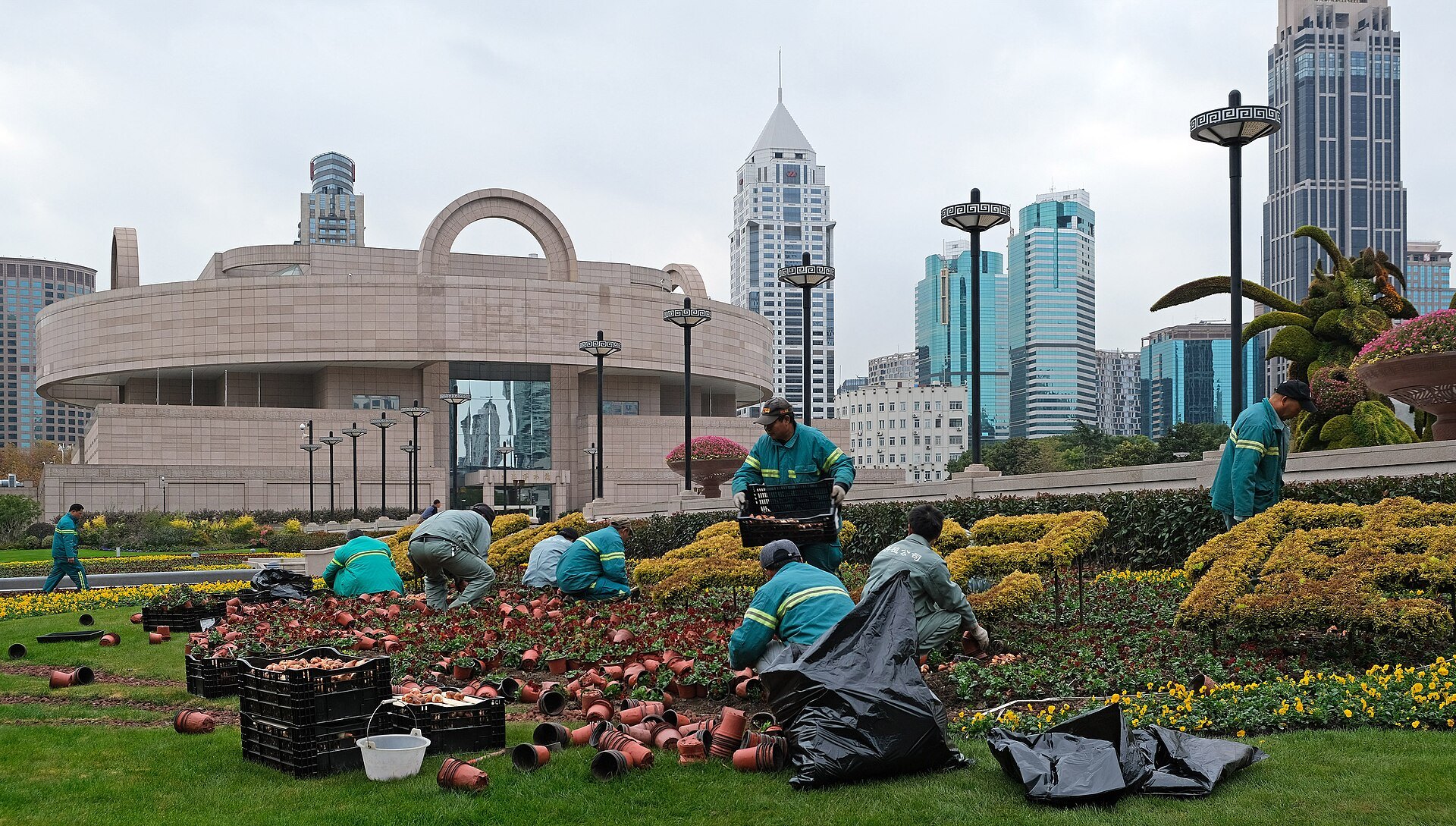 Flower beds being planted out on People's Square