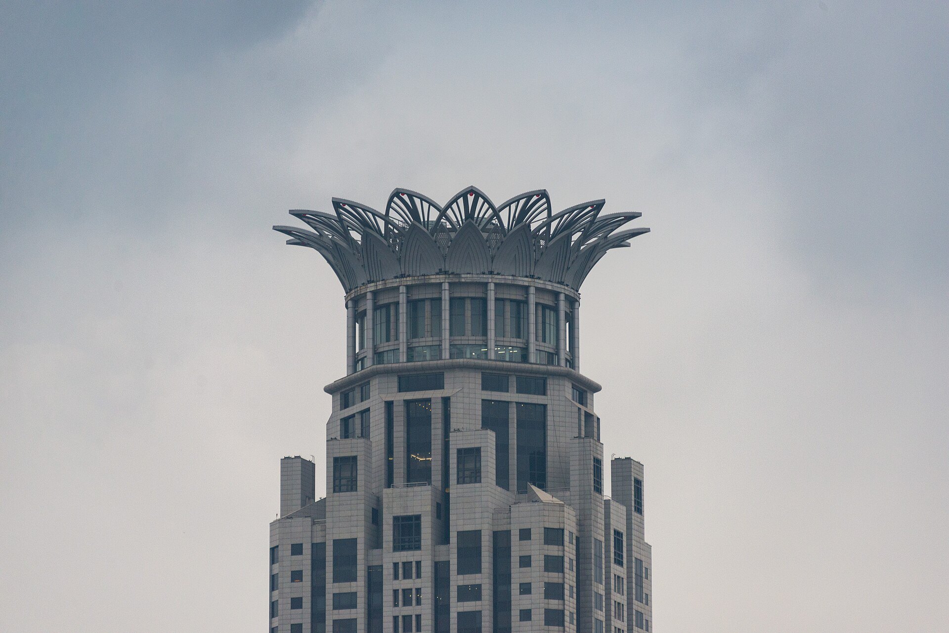 The upper storeys of a Bund building against the sky
