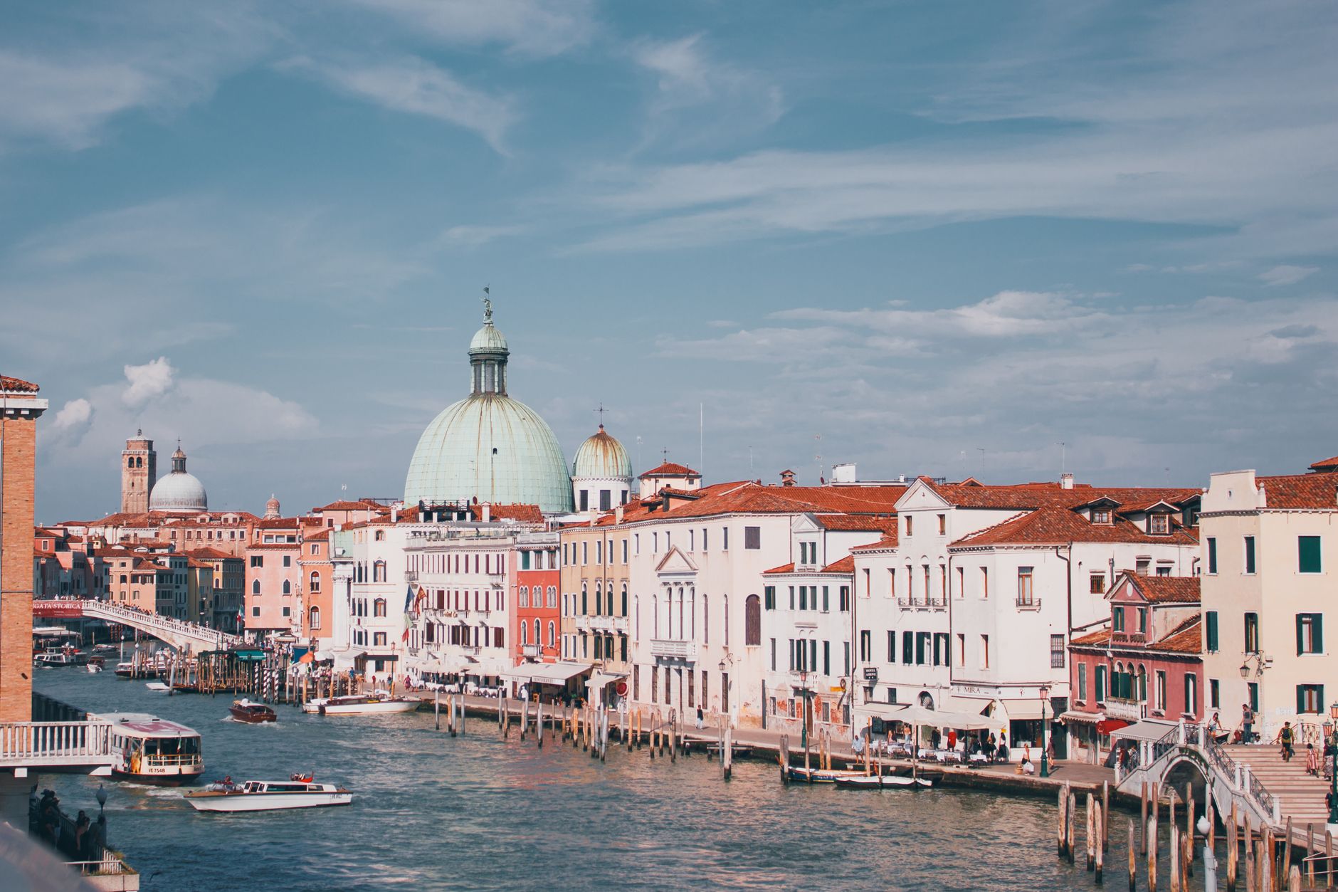 Explore the cityscape of Venice's Grand Canal with architecture and colors