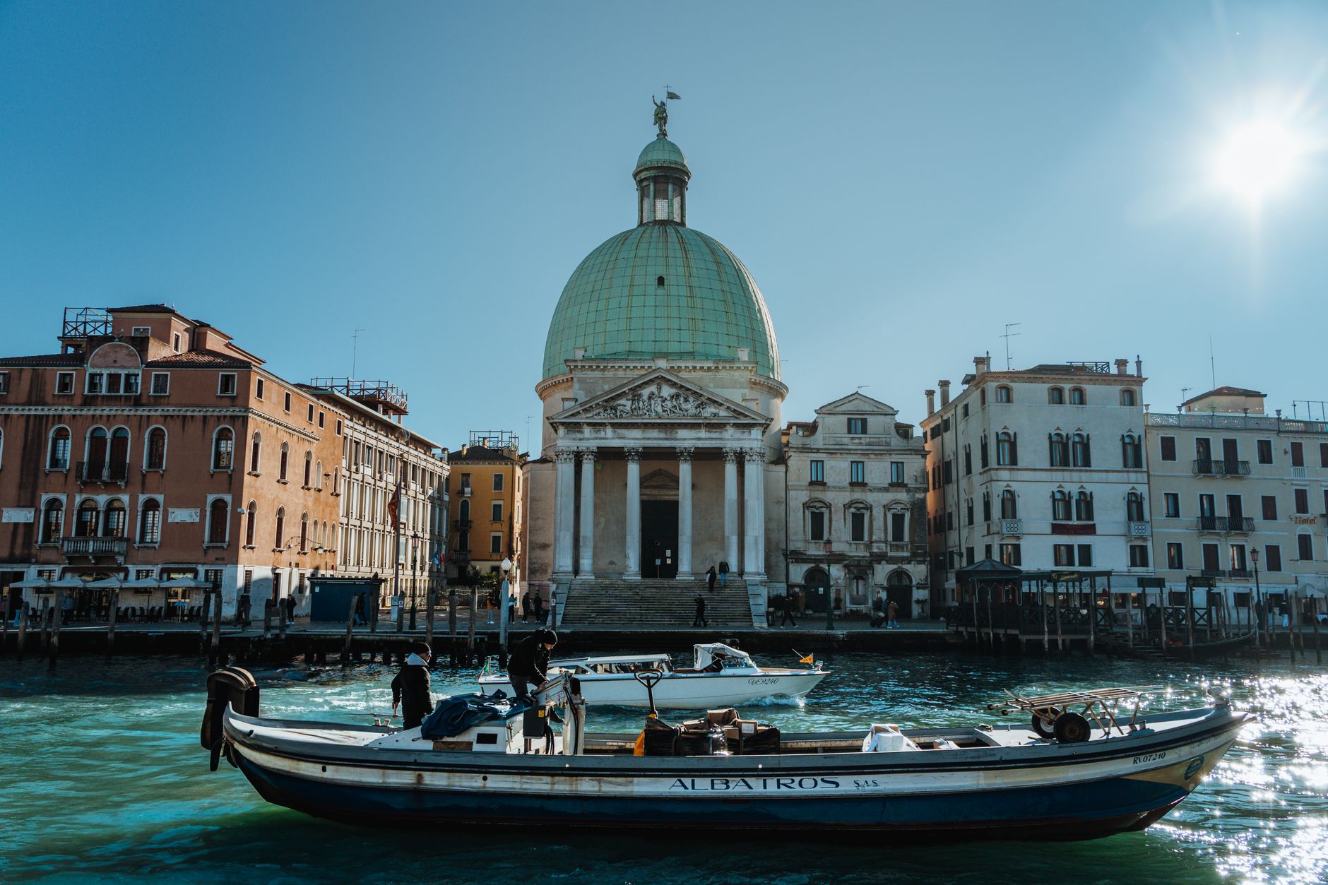 Grand Canal with a boat and historical architecture in Venice, Italy