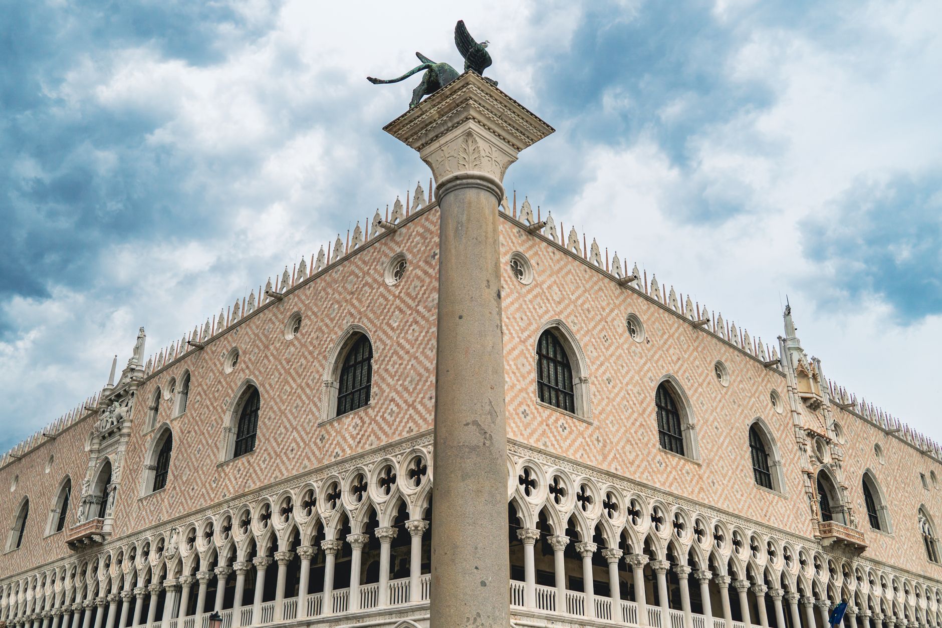 Architectural detail of Doge's Palace, Venice with clear sky backdrop