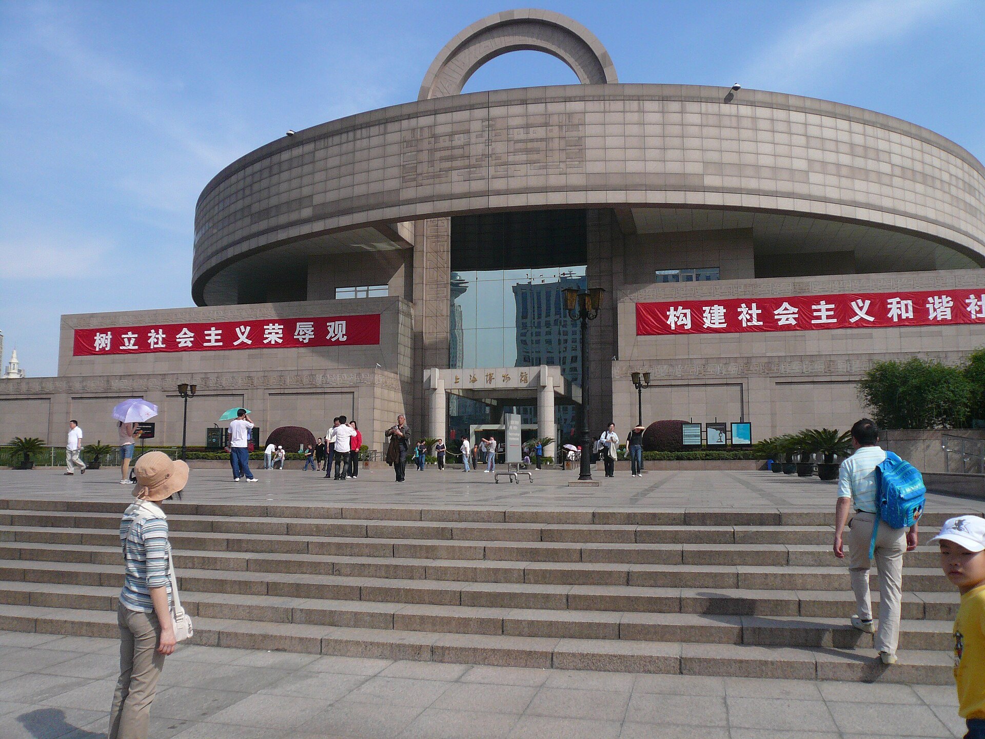 The round bronze-vessel form of the Shanghai Museum above its steps