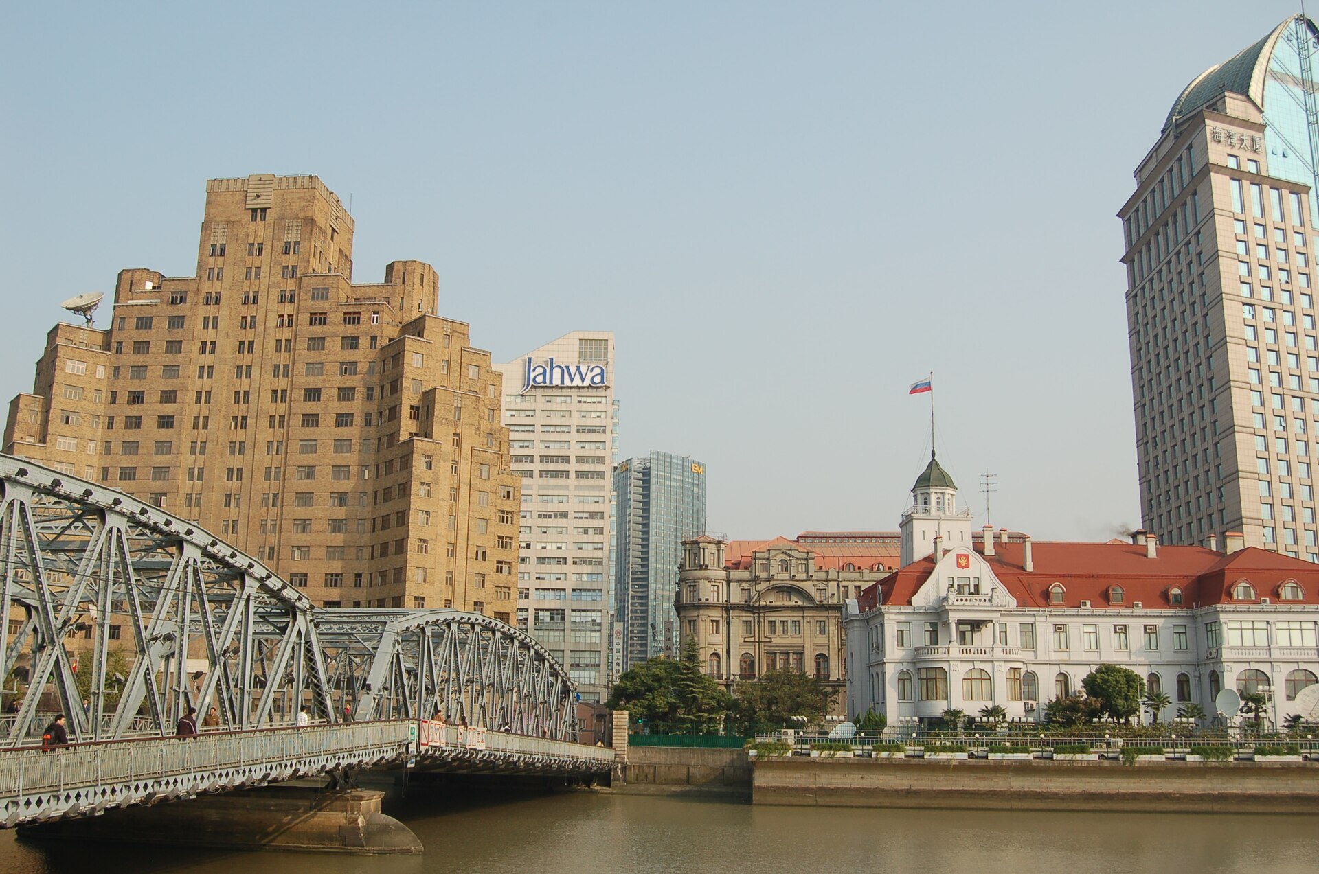 The steel Garden Bridge over Suzhou Creek with Broadway Mansions behind