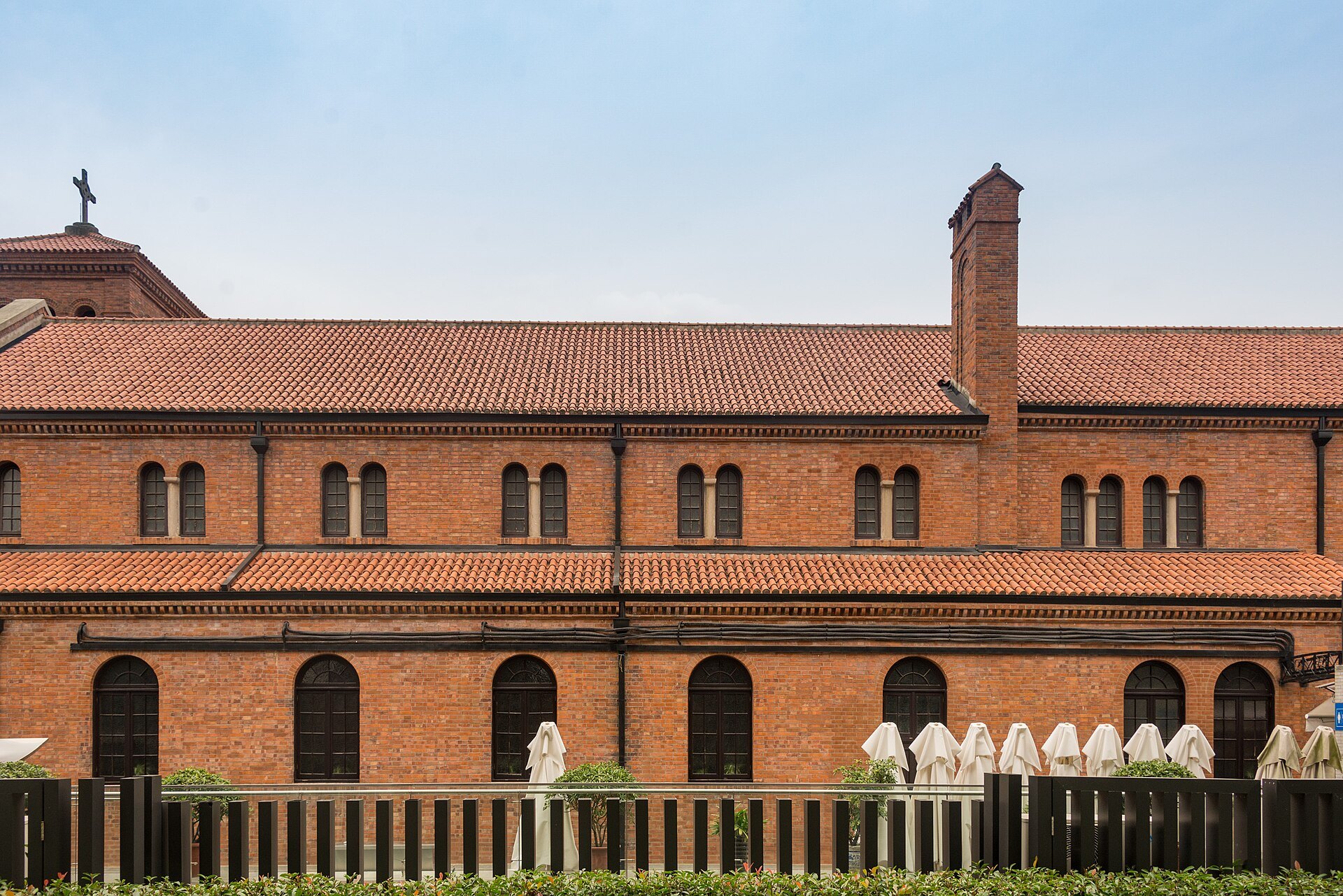 The brick and tile roofline of the restored lane houses